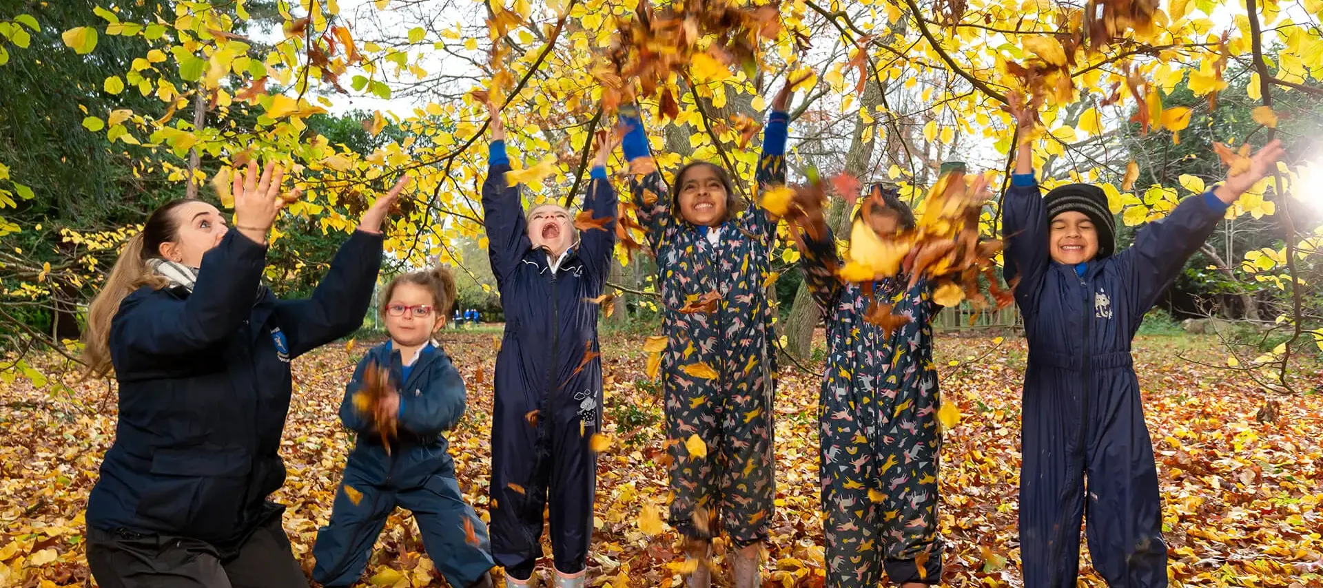 Children enjoying Forest School at The Gregg Prep