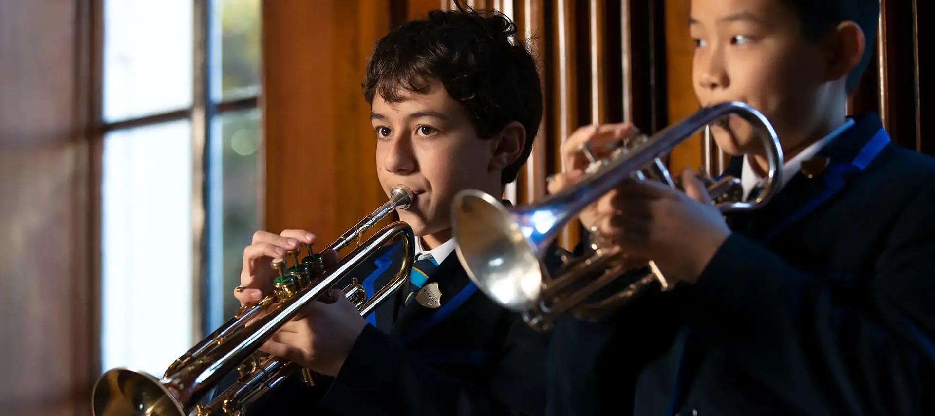 Pupils at The Gregg School playing trumpet