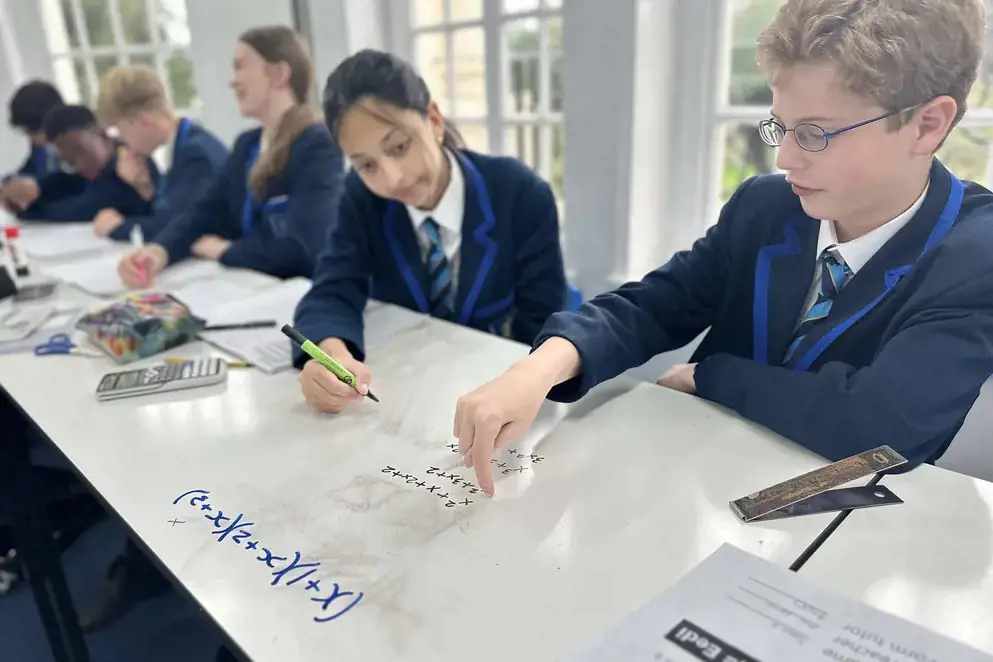 Students at the Gregg School working in class together